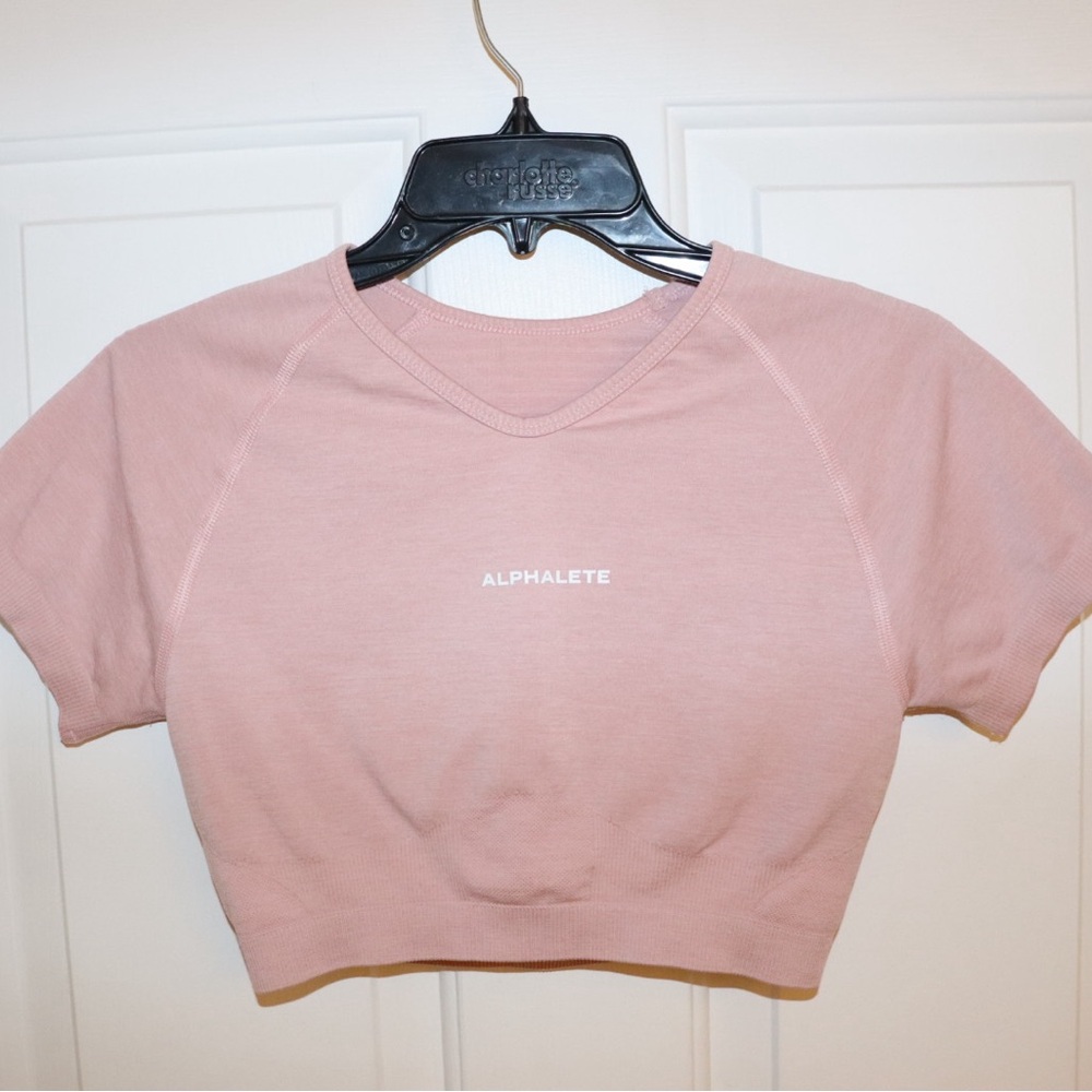 Size Medium Alphalete Amplify crop top. Worn maybe twice. EUC. Light pink.